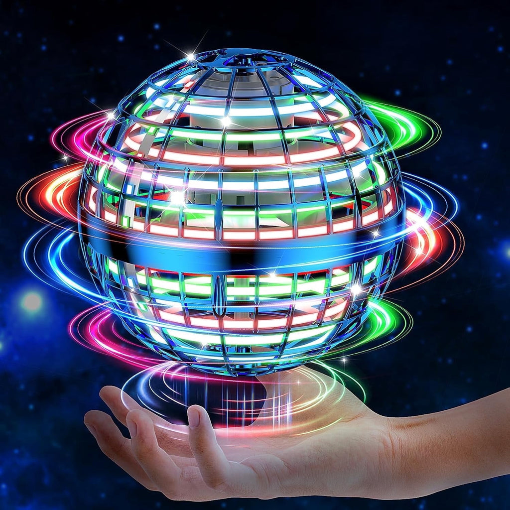 Flying orb ball toy glowing with rainbow rings in hand