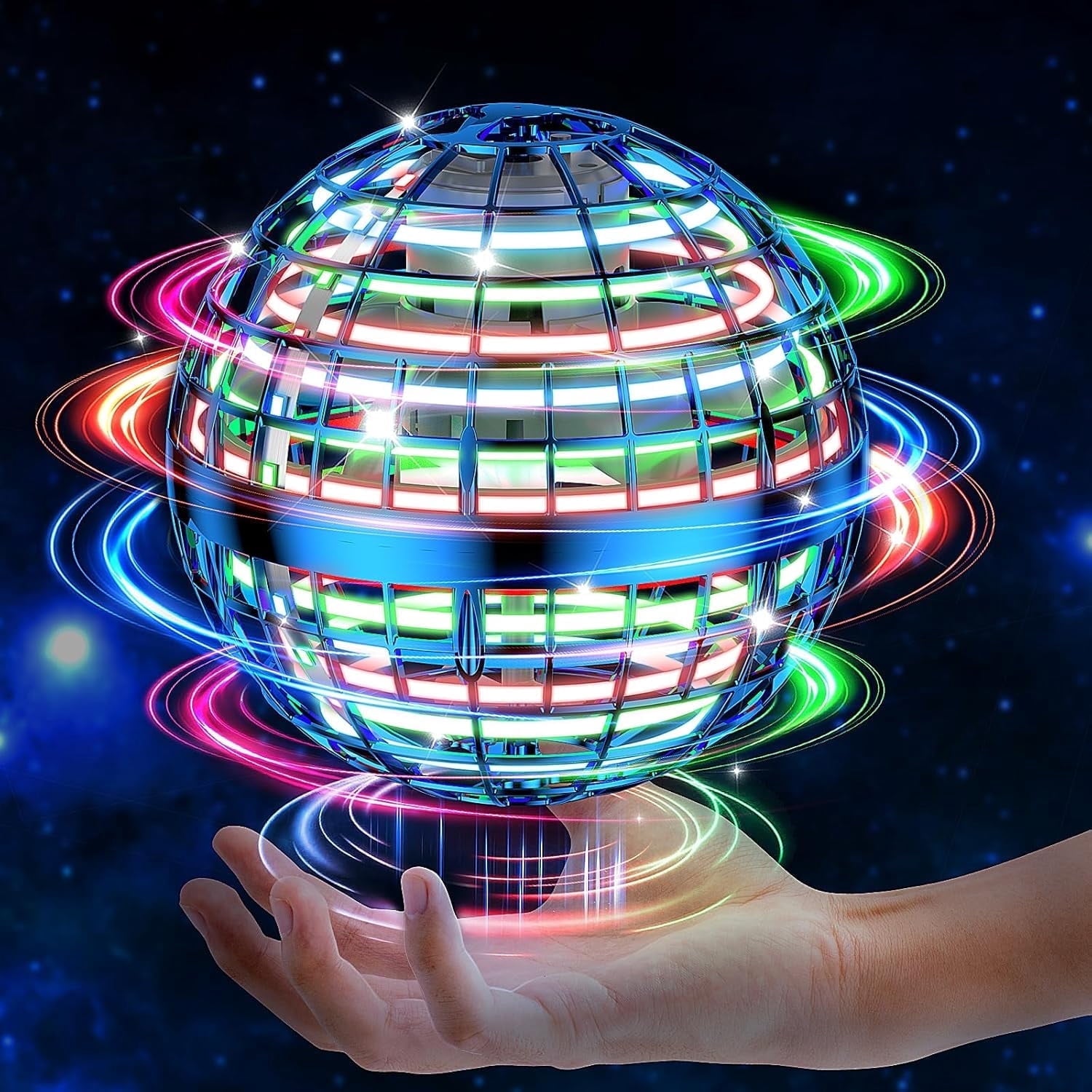 Flying orb ball toy glowing with rainbow rings in hand